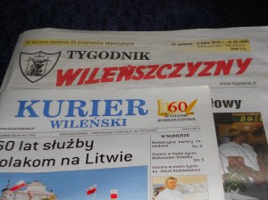 In the foreground is the former employer of Ms Halina, but she also wrote for other newspapers